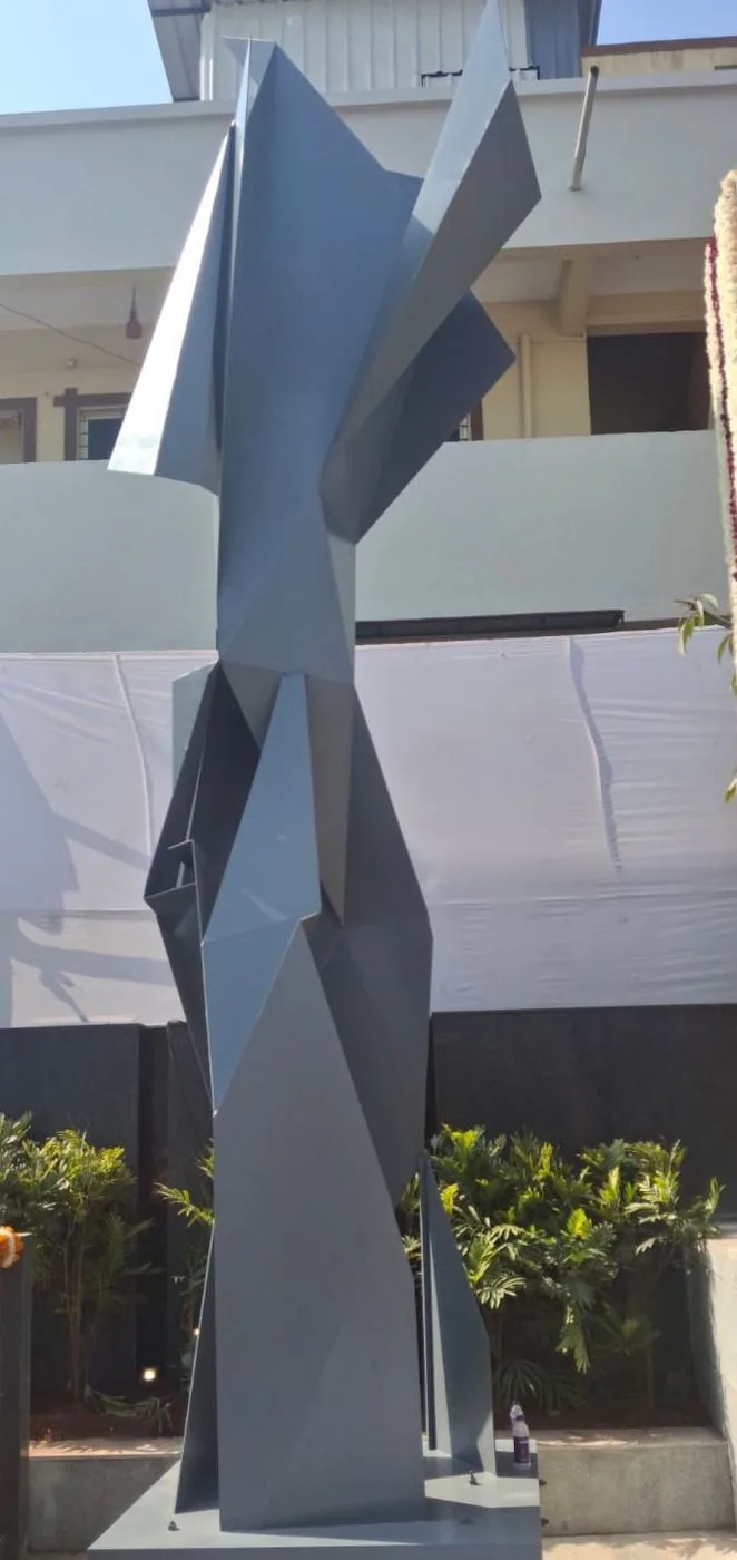 Prerna Stambh, a tall faceted sculpture in Pune